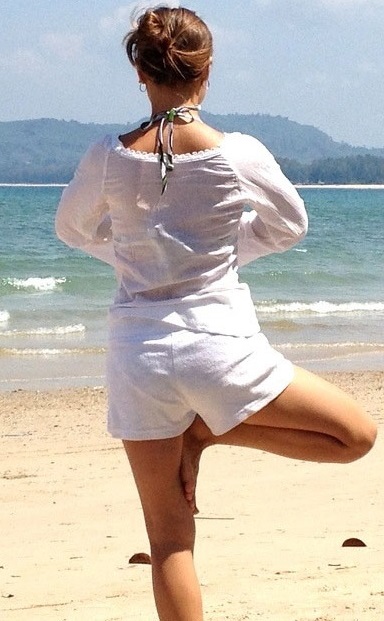 Woman standing in yoga pose